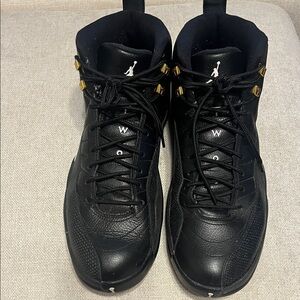 Jordan Men’s Black and Gold High-Top Sneakers